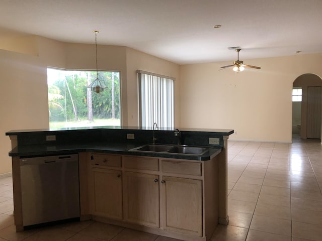 kitchen with dishwasher, ceiling fan, sink, and light tile patterned flooring