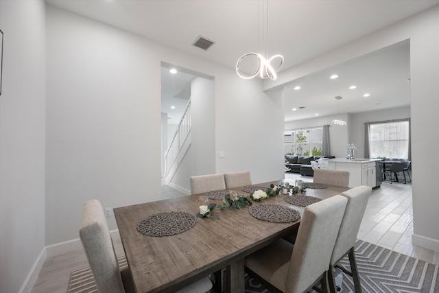 dining room featuring light hardwood / wood-style floors