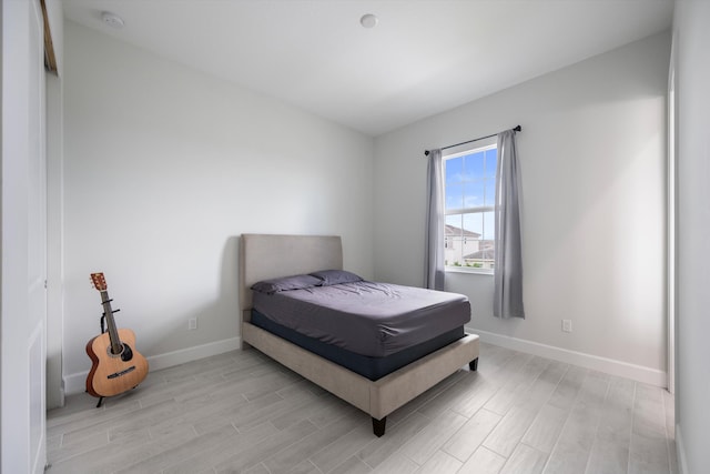 bedroom with light wood-type flooring