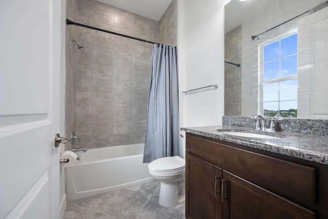 full bathroom featuring tile patterned floors, shower / bath combo, vanity, and toilet