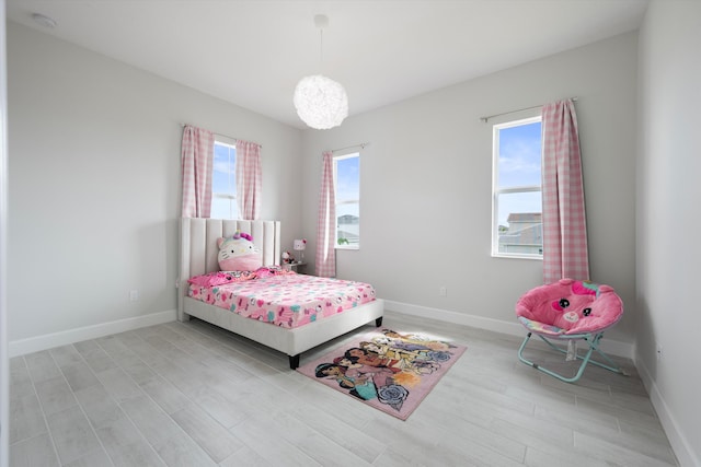 bedroom featuring light hardwood / wood-style flooring