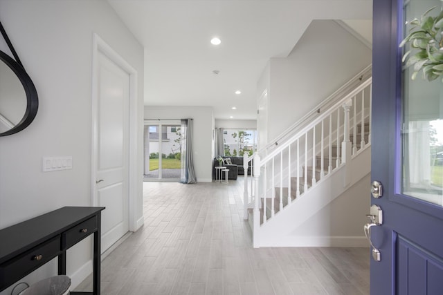 foyer entrance featuring light hardwood / wood-style flooring