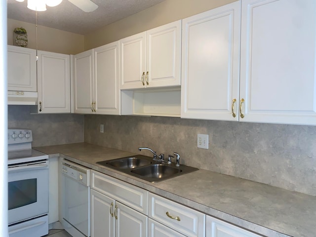 kitchen featuring white appliances, white cabinetry, and ceiling fan