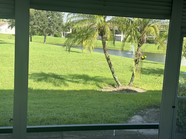 view of yard with a water view