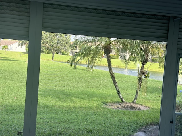 view of yard with a water view