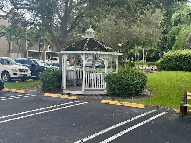 view of parking with a gazebo