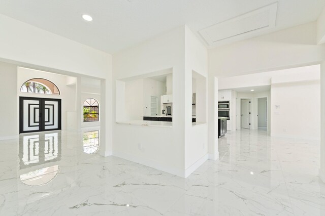 interior space featuring white cabinets