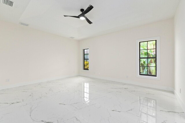 spare room featuring ceiling fan