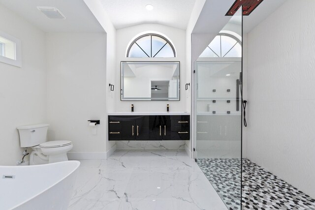 full bathroom with vanity, separate shower and tub, vaulted ceiling, and toilet