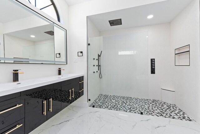 bathroom with vanity and an enclosed shower