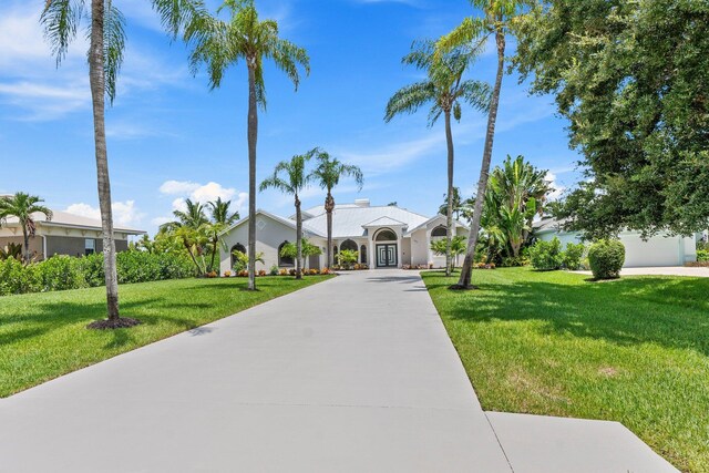 exterior space featuring a yard and a garage