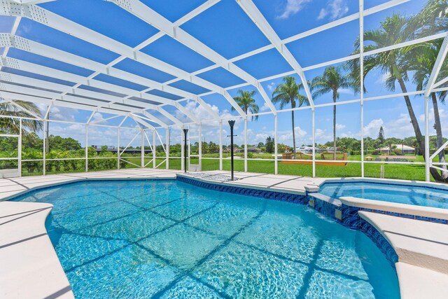 view of pool with a lanai