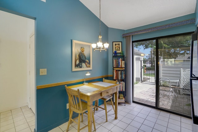 dining space featuring vaulted ceiling, a healthy amount of sunlight, light tile patterned flooring, and a notable chandelier