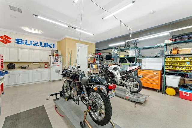 garage with white refrigerator