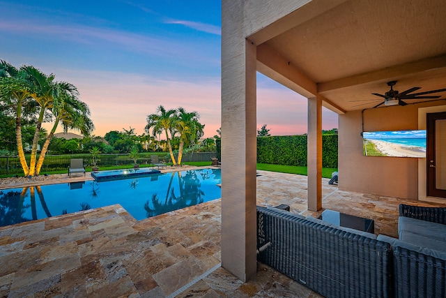 view of pool featuring a patio area and ceiling fan