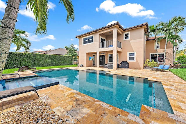 view of pool featuring a patio