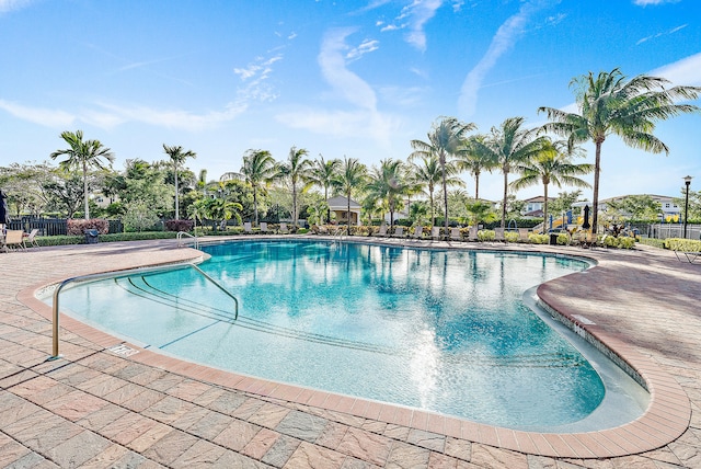 view of swimming pool with a patio area