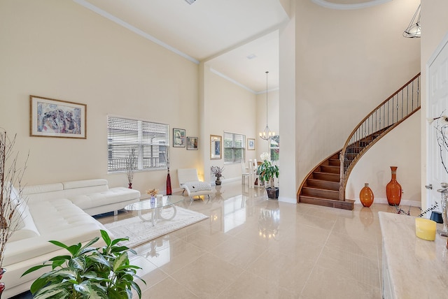 living room featuring ornamental molding, light tile patterned floors, a high ceiling, and an inviting chandelier