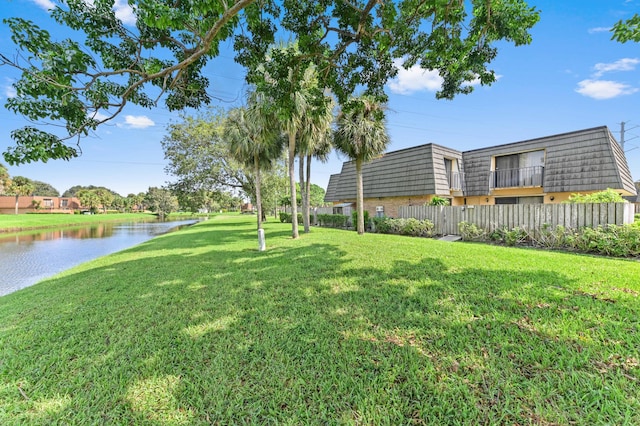 view of yard with a water view