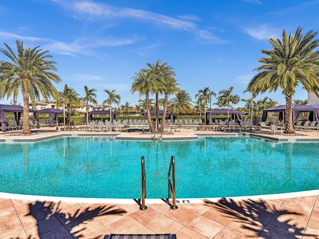 view of pool featuring a gazebo and a patio