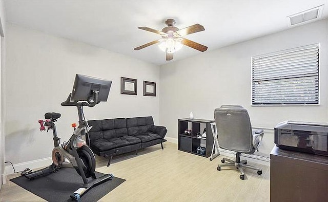 office space featuring light hardwood / wood-style flooring and ceiling fan