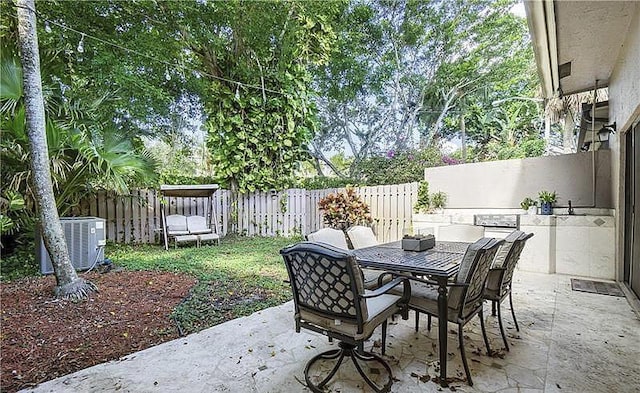 view of patio with central AC