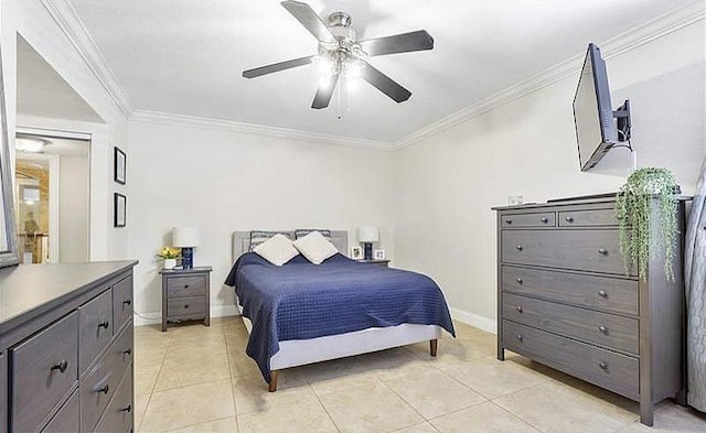 bedroom with ceiling fan, light tile patterned floors, and crown molding