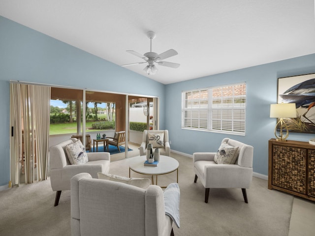 tiled dining area with vaulted ceiling and ceiling fan