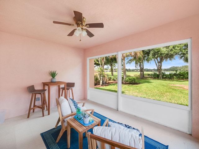 view of patio featuring ceiling fan