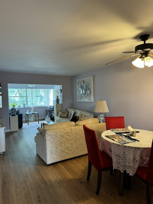 3220 Holiday Springs Blvd Unit 1-306, Margate, FL 33063 - living room featuring wood finished floors and a ceiling fan