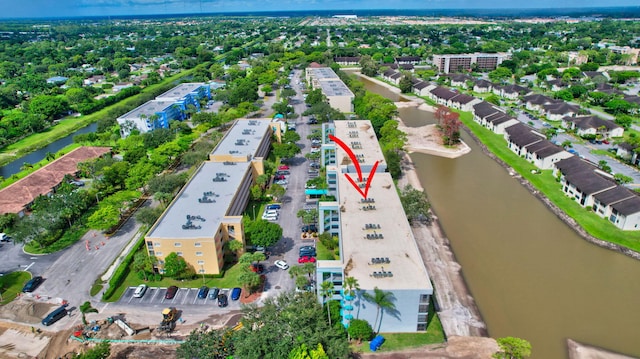 drone / aerial view featuring a water view