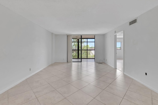 view of tiled spare room