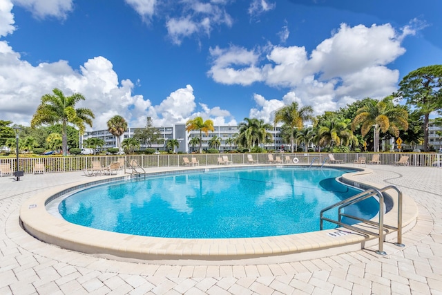 view of swimming pool featuring a patio