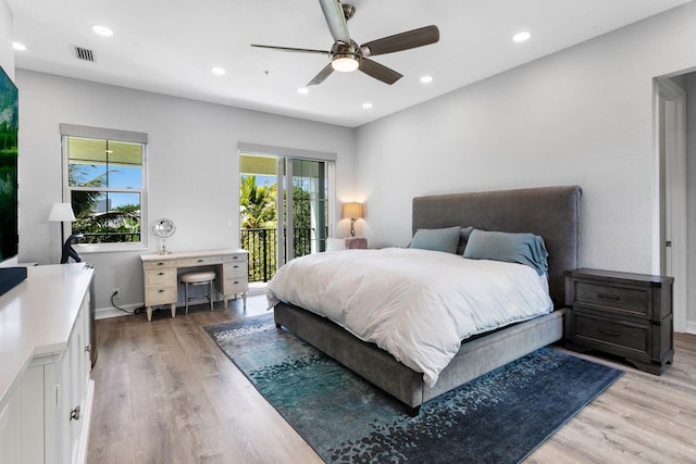 bedroom with access to outside, ceiling fan, and light hardwood / wood-style floors