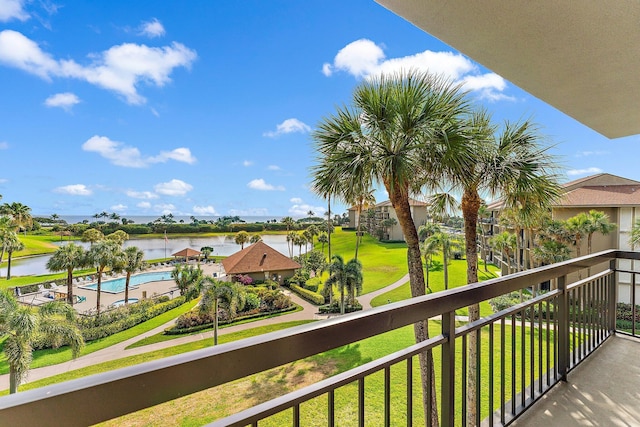 balcony featuring a water view