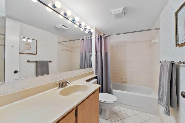 full bathroom featuring vanity, toilet, shower / bath combo, and tile patterned flooring