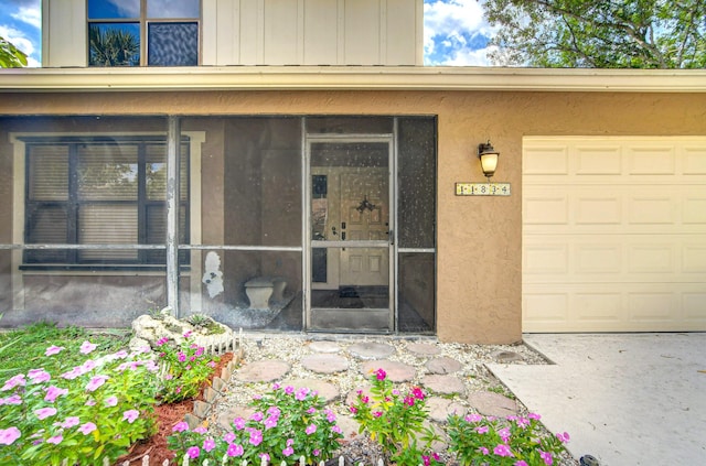 property entrance featuring a garage