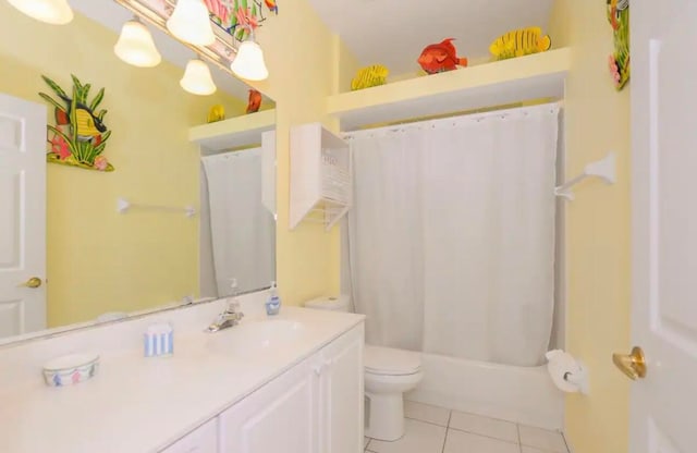 bathroom with toilet, tile patterned flooring, shower / bath combo with shower curtain, and vanity