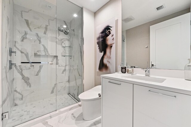 bathroom with toilet and hardwood / wood-style flooring