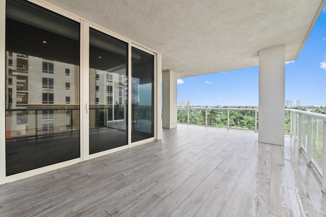 unfurnished living room featuring light wood-type flooring