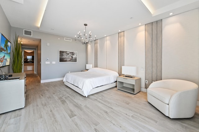 bedroom featuring light hardwood / wood-style flooring