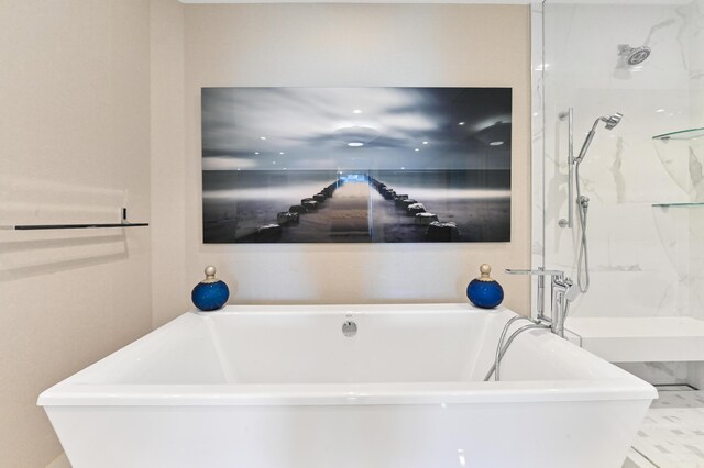 bathroom featuring vanity and shower with separate bathtub