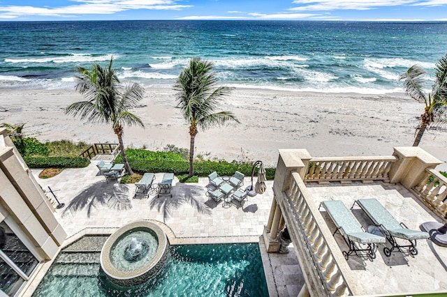 property view of water featuring a beach view