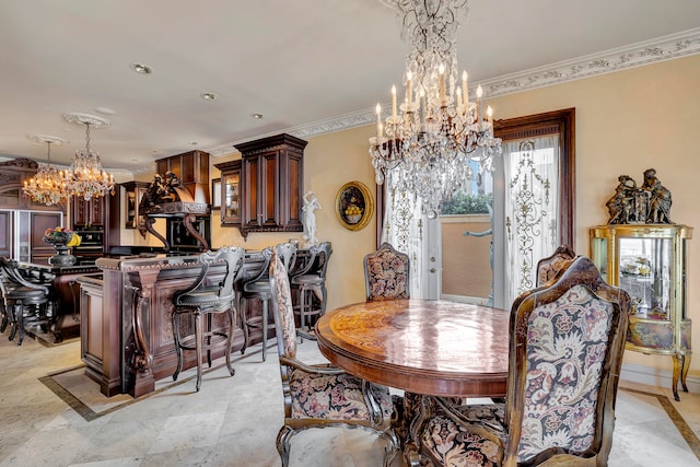 dining room featuring a notable chandelier and ornamental molding