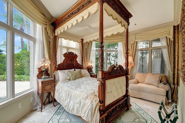 bedroom with crown molding