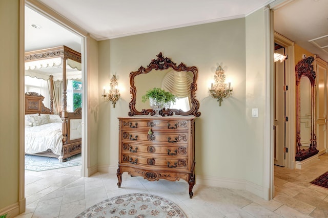 hallway featuring crown molding