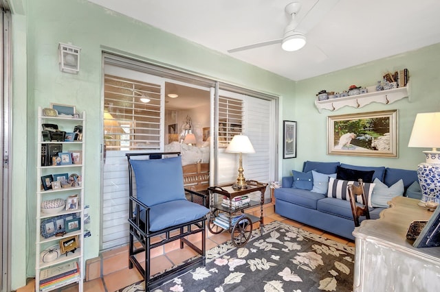 tiled living room with ceiling fan