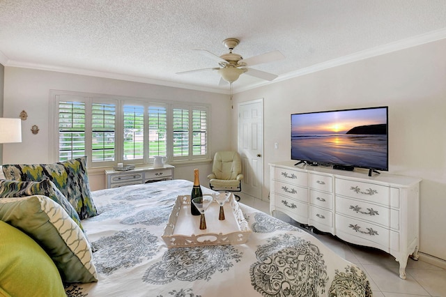 bedroom featuring crown molding, a textured ceiling, light tile patterned flooring, and ceiling fan