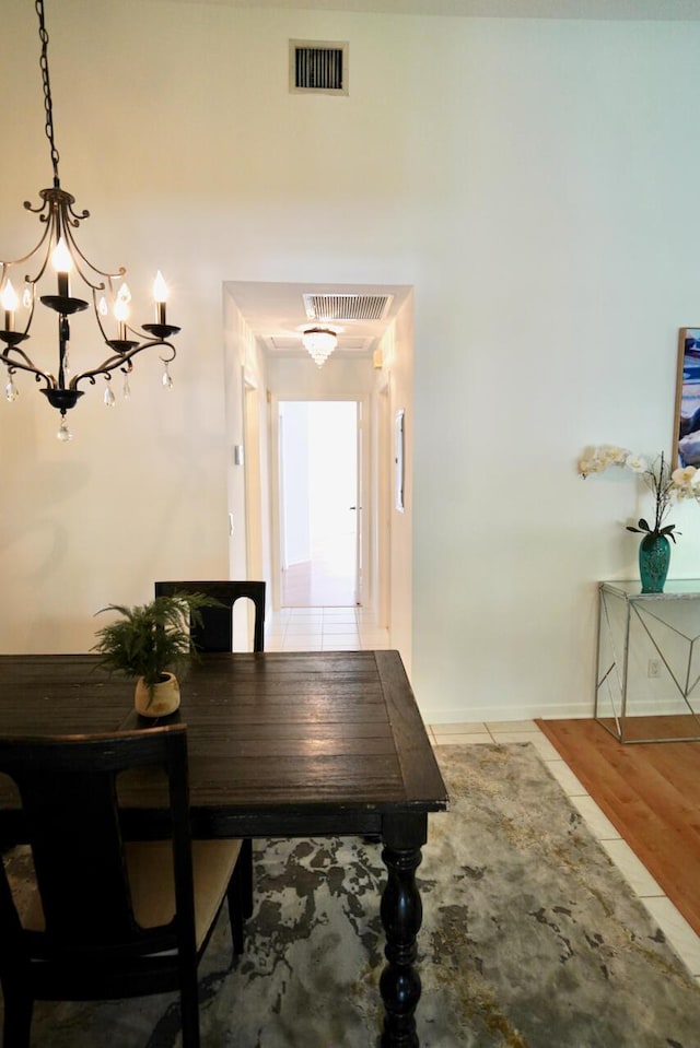 2121 S Ocean Blvd Unit 804, Lauderdale By The Sea, FL 33062 - dining space featuring a chandelier and light wood-style floors