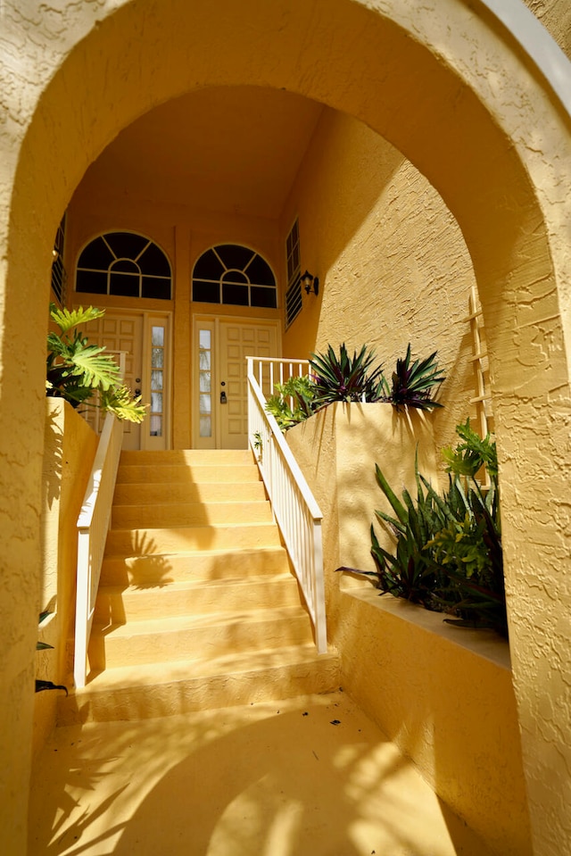 property entrance featuring french doors